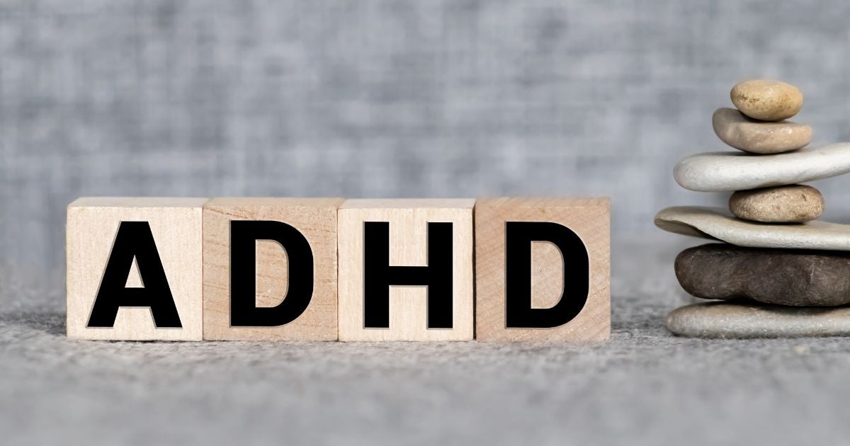 ADHD - word - letters - rocks